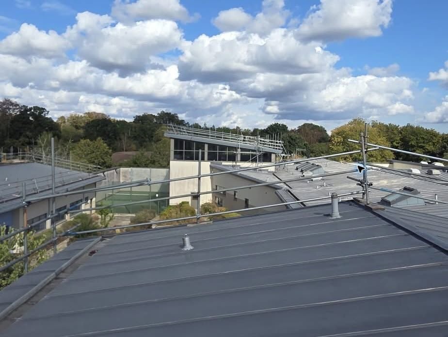 Commercial NHS roof edge-protection handrail scaffolding project in Southampton