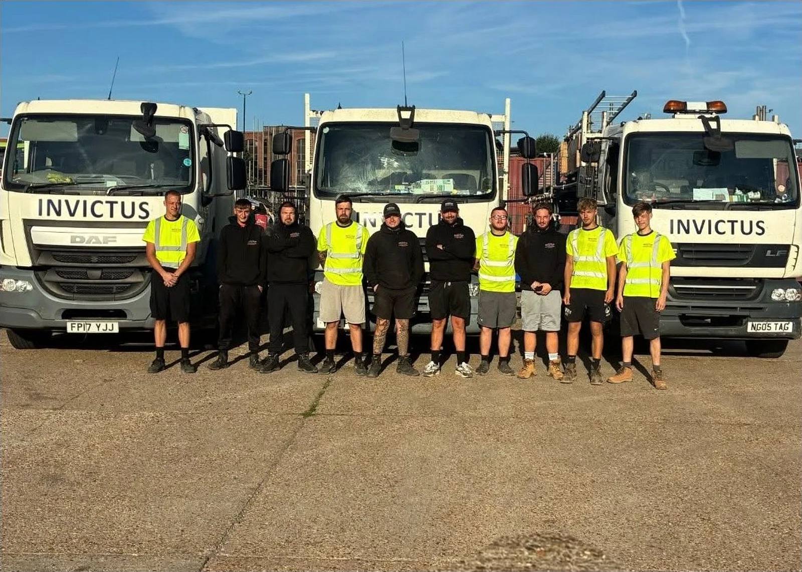 The Invictus Scaffolding team with company lorries in Southampton