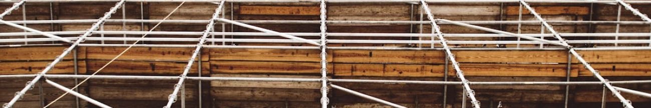 A detailed view of scaffolding at a construction site shows structure and pattern.